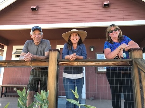 Left to right: Jim Woods (volunteer), Lori Leonard (River Fork Ranch Preserve Manager), and Kris Kirkpatrick (Senior Philanthropy Advisor) at the Whit Hall Interpretive Center — Photo by Author